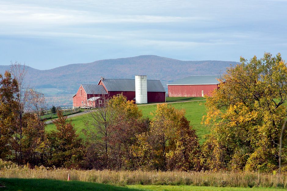 Red barn on a hillside farm, typical of the countryside around Spencer, NY.