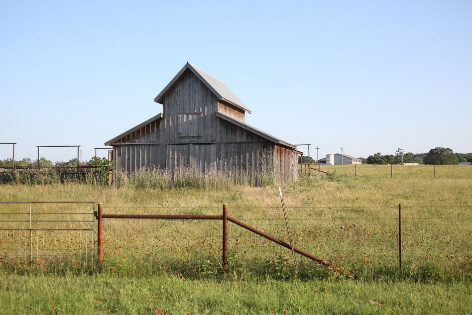 Rural crossroads with a barn, typical of the countryside around Van Etten, NY.