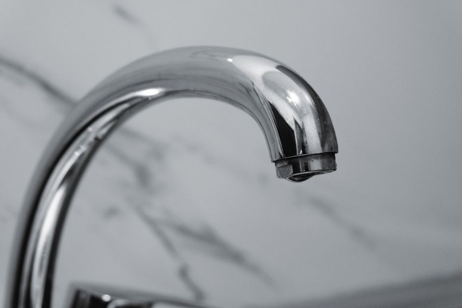 Close-up of a household water faucet.